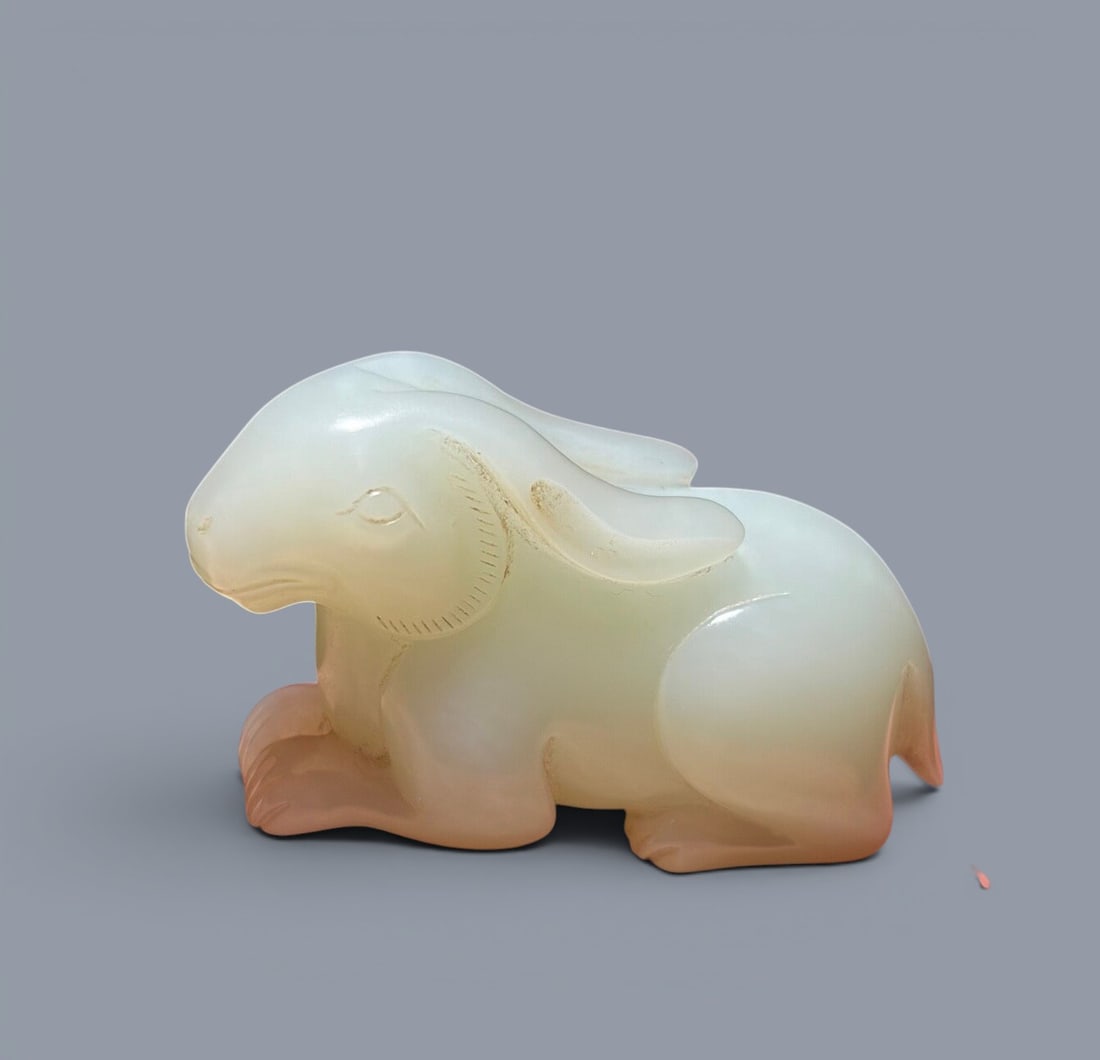 Chinese Art, A White Jade Rabbit, 17th-18th Century, Qing Dynasty: Chinese Art, A White Jade Rabbit, 17th-18th Century, Qing Dynasty, Length 5.5 cm, Height 3.1 cm, Width 2 cm .