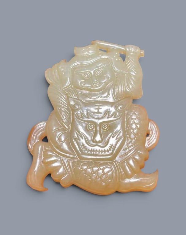 Chinese Art, A Yellow Jade Figure of a Person, 16th-18th Century, Qing Dynasty: Chinese Art, A Yellow Jade Figure of a Person, 16th-18th Century, Qing Dynasty, Height 7.6 cm, Length 5.7 cm, Width 0.74 cm.