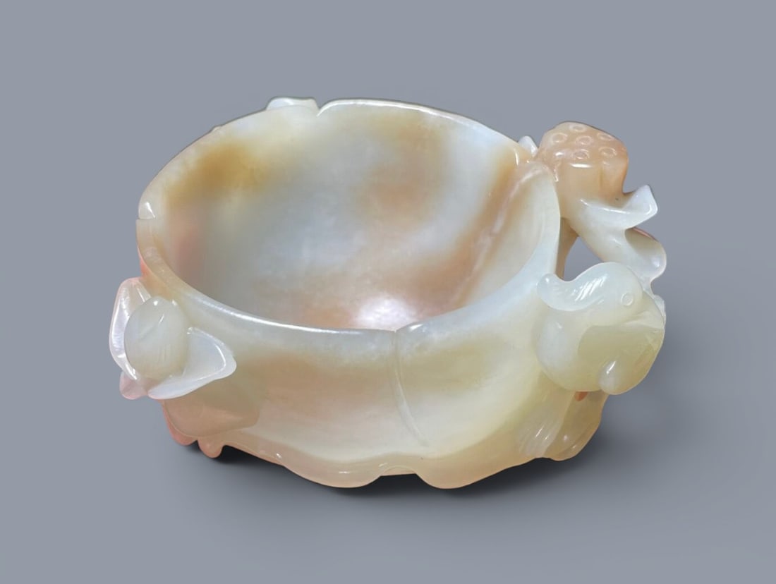 Chinese Art, A Jade Bowl Decorated with Lotus Roots and Birds, 18th-19th Century, Qing Dynasty: Chinese Art, A Jade Bowl Decorated with Lotus Roots and Birds, 18th-19th Century, Qing Dynasty, Length 8.1 cm, Width 6.7 cm, Height 4 cm.
