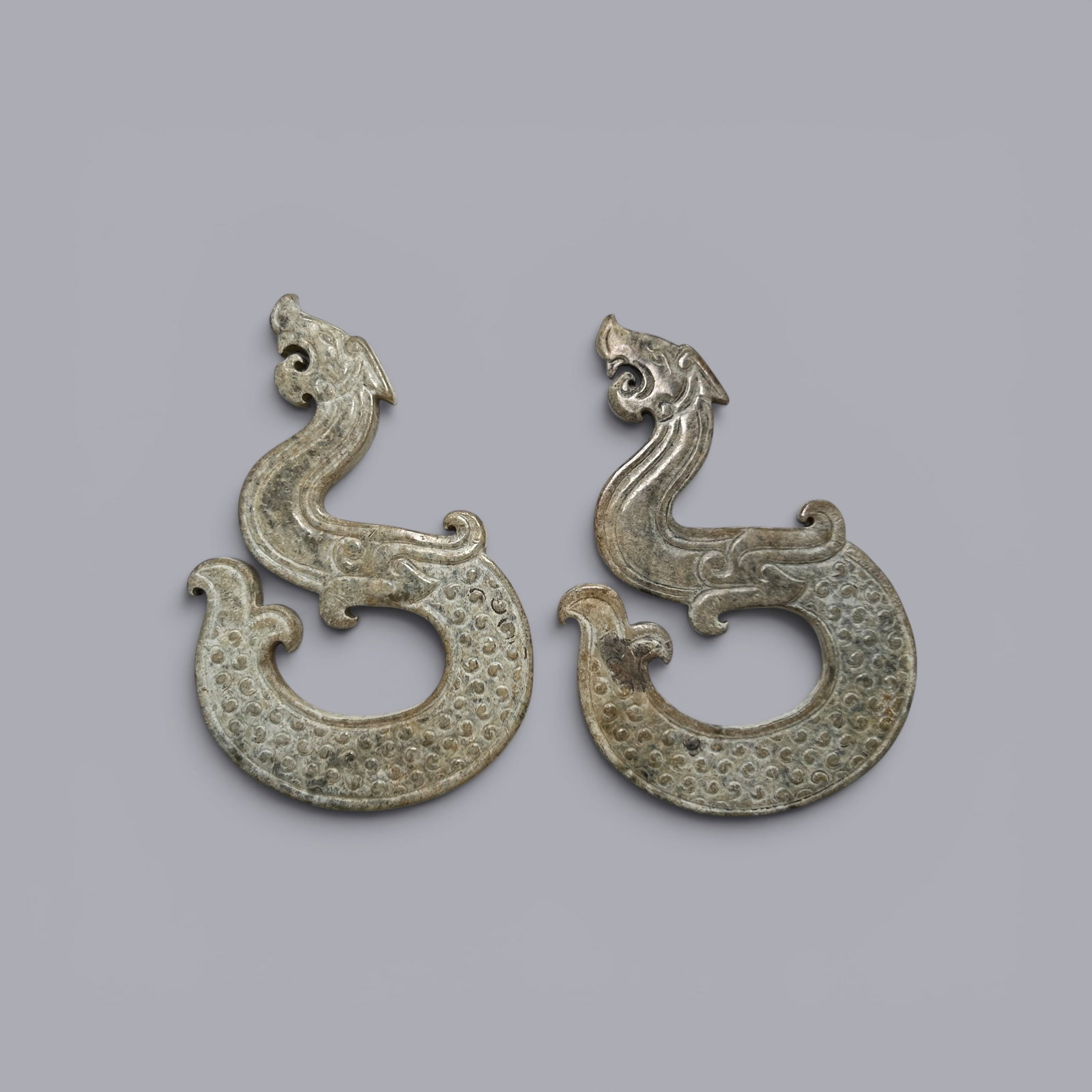 Chinese Art, A Pair of Jade Dragons, 3rd Century BC-3rd Century AD, Han Dynasty: Chinese Art, A Pair of Jade Dragons, 3rd Century BC-3rd Century AD, Han Dynasty, Height 8.5 cm, Width 5.5 cm.