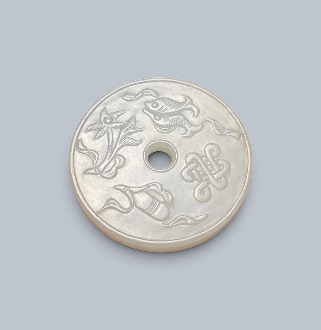 Chinese Art, A Jade Plaque Decorated with Buddhist Eight Auspicious Symbols, 16th-18th Century,: Chinese Art, A Jade Plaque Decorated with Buddhist Eight Auspicious Symbols, 16th-18th Century, Qing Dynasty, Diameter 5 cm, Height 0.6 cm.