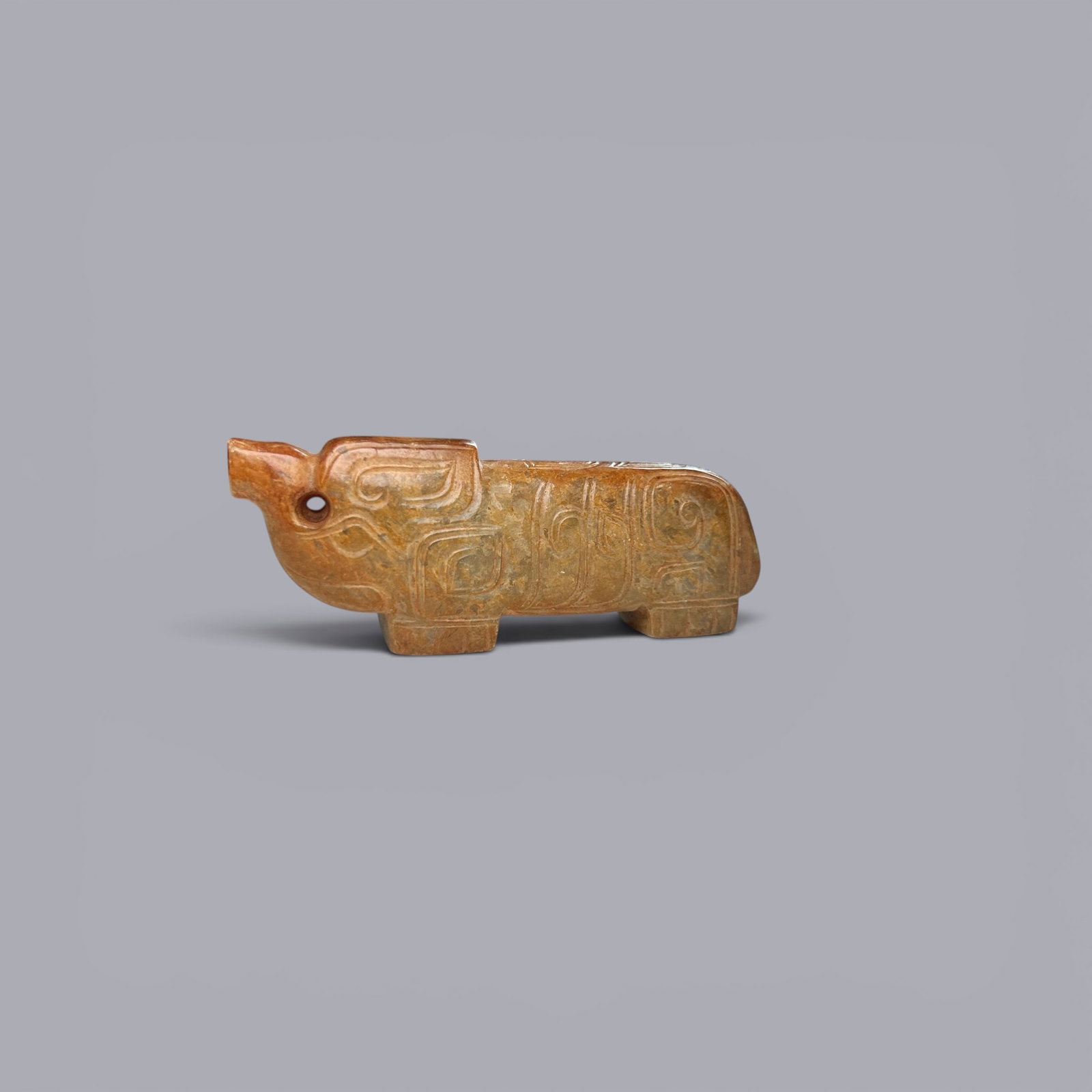 Chinese Art, A Jade Pig, 11th Century BC-3rd Century BC, Zhou Dynasty: Chinese Art, A Jade Pig, 11th Century BC-3rd Century BC, Zhou Dynasty, Length 2.3 cm, Width 8 cm.