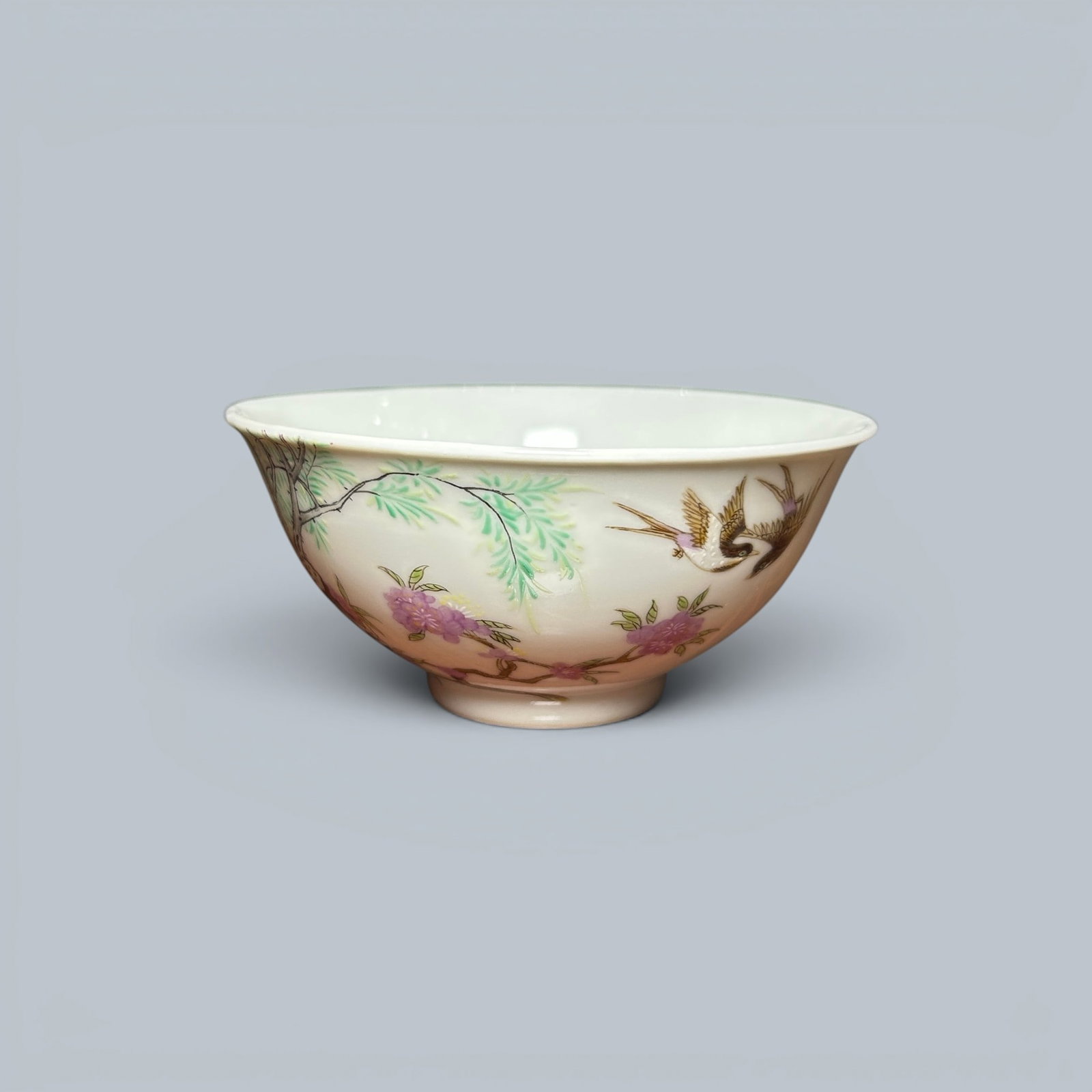 Chinese Art, A Famille Rose Bowl Decorated with Birds and Flowers, 18th Century, Qing Dynasty: Chinese Art, A Famille Rose Bowl Decorated with Birds and Flowers, 18th Century, Qing Dynasty, Height 4.2 cm, Diameter 8.9 cm.