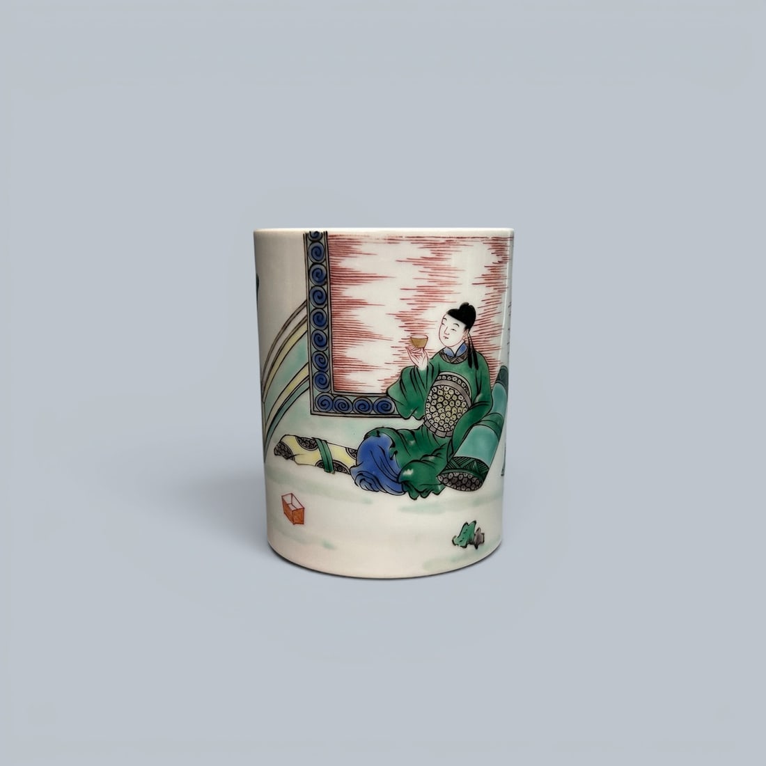 Chinese Art, A Wucai Brushpot Decorated with Figures, 17th-18th Century, Qing Dynasty: Chinese Art, A Wucai Brushpot Decorated with Figures, 17th-18th Century, Qing Dynasty, Height 9.4 cm, Diameter 7.2 cm.