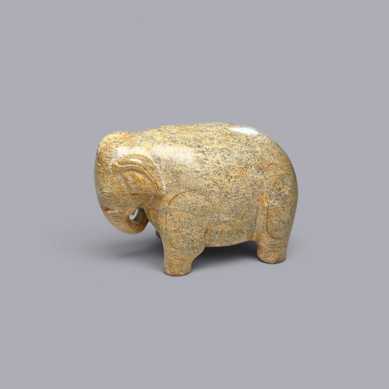 Chinese Art, A Jade Elephant, 3rd Century BC-3rd Century AD, Han Dynasty: Chinese Art, A Jade Elephant, 3rd Century BC-3rd Century AD, Han Dynasty, Height 4.6 cm, Length 7.1 cm, Width 4.1 cm .