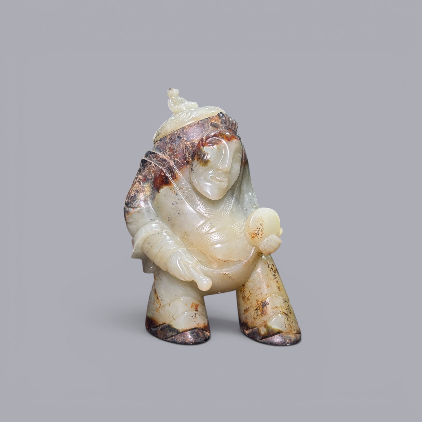 Chinese Art, A Jade Figure of a Person, 3rd Century BC-3rd Century AD, Han Dynasty: Chinese Art, A Jade Figure of a Person, 3rd Century BC-3rd Century AD, Han Dynasty, Height 14.3 cm.