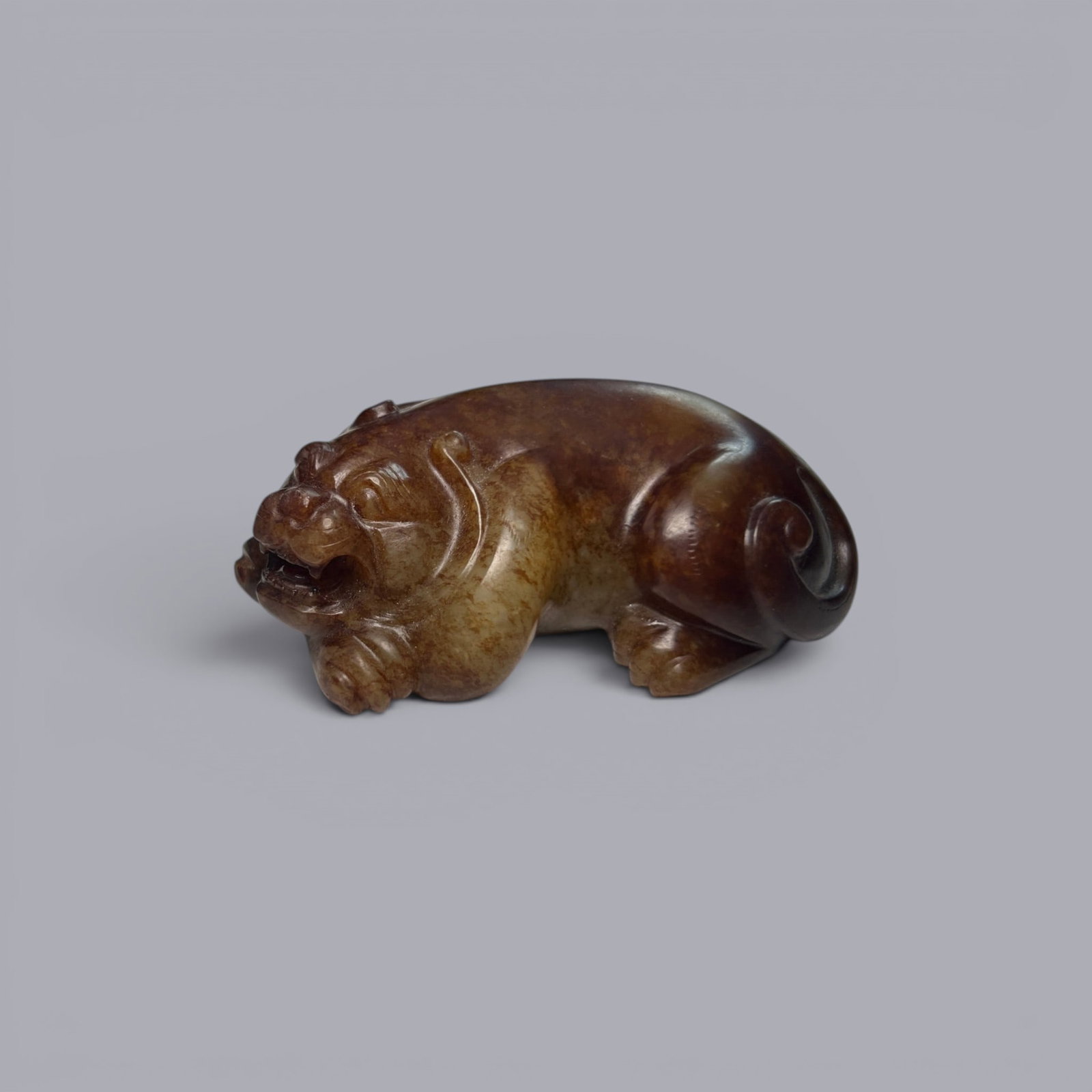 Chinese Art, A Jade Beast, 3rd Century BC-3rd Century AD, Han Dynasty: Chinese Art, A Jade Beast, 3rd Century BC-3rd Century AD, Han Dynasty, Length 7 cm, Width 4.1 cm, Height 2.1 cm.