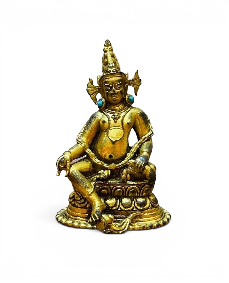 Himalayan Art, Tibet, A Gilt-Bronze Figure of a Wealth Deity, 16th-18th Century: Himalayan Art, Tibet, A Gilt-Bronze Figure of a Wealth Deity, 16th-18th Century, Height 5.5 cm.