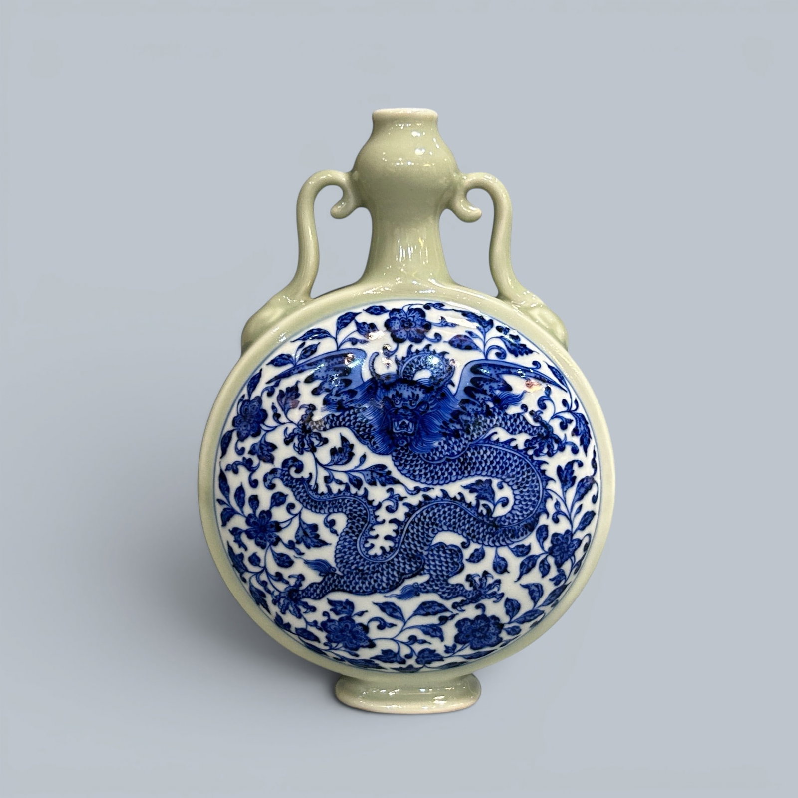 Chinese Art, A Blue and White Vase Decorated with Dragons, 18th Century, Qing Dynasty: Chinese Art, A Blue and White Vase Decorated with Dragons, 18th Century, Qing Dynasty, Height 17.6 cm.