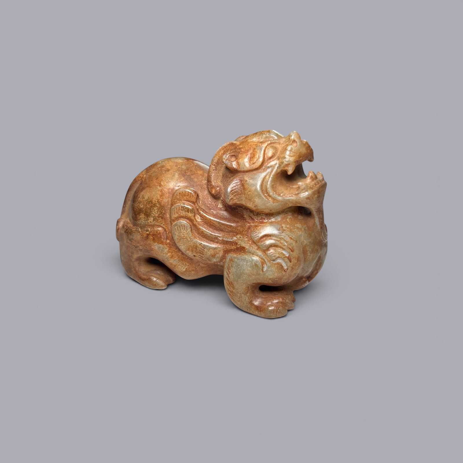 Chinese Art, A Jade Beast, 3rd Century BC-3rd Century AD, Han Dynasty: Chinese Art, A Jade Beast, 3rd Century BC-3rd Century AD, Han Dynasty, Height 4.8 cm, Length 6.1 cm, Width 3.9 cm.