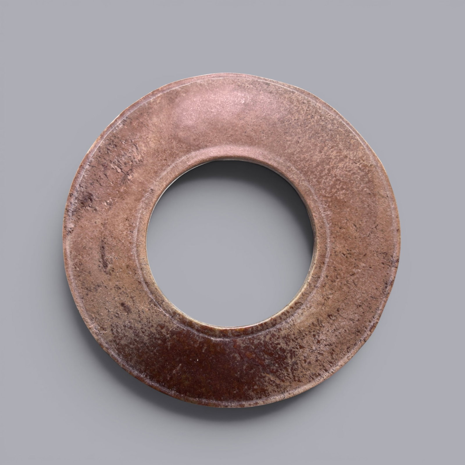 A Jade Bi Disc, 5th–3rd Century BC, Warring States Period: A Jade Bi Disc, 5th–3rd Century BC, Warring States Period, Diameter 14.3 cm.