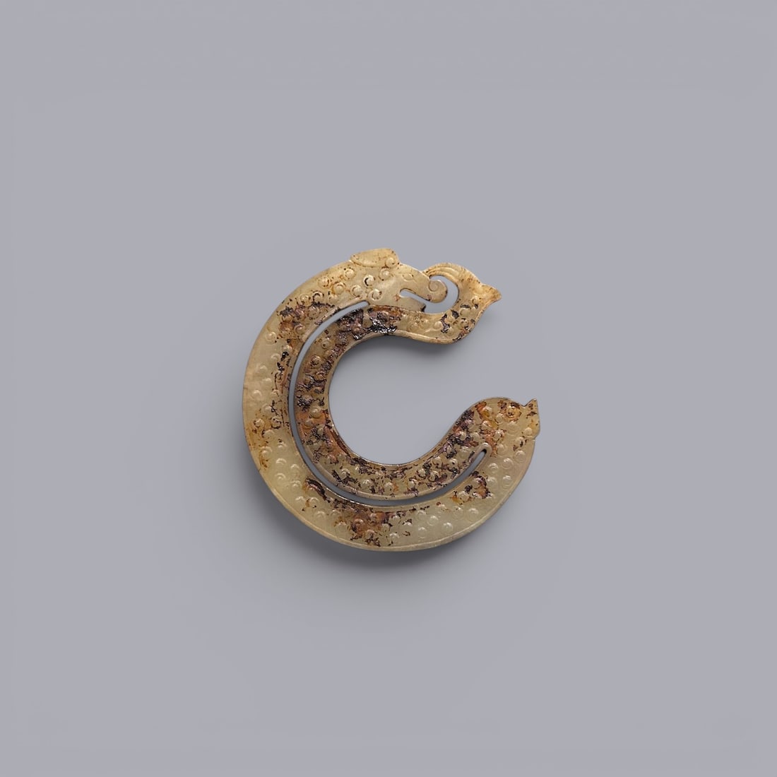 A Jade Dragon, 5th–3rd Century BC, Warring States Period: A Jade Dragon, 5th–3rd Century BC, Warring States Period, Width 9.1 cm.