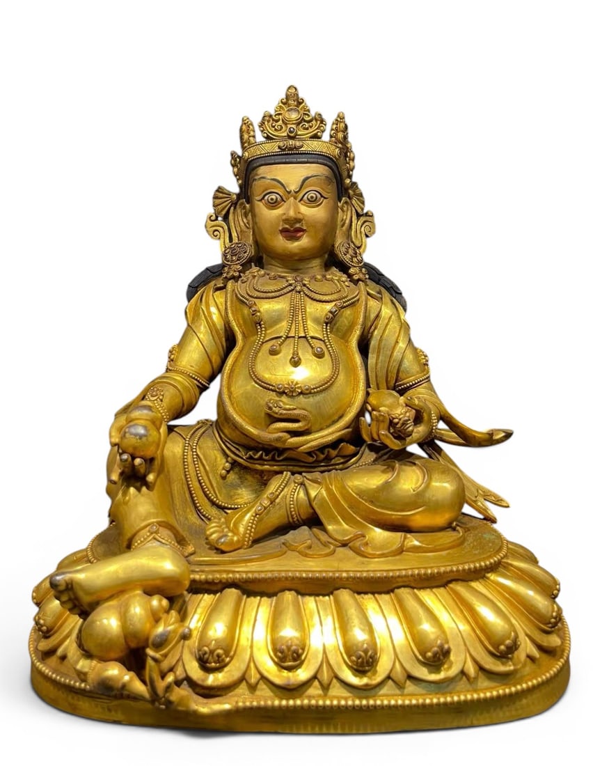 Himalayan Art, Tibet, 16th–18th Century, A Gilt Bronze Figure of Yellow Jambhala: Himalayan Art, Tibet, 16th–18th Century, A Gilt Bronze Figure of Yellow Jambhala, Height: 44 cm, Width: 36 cm.