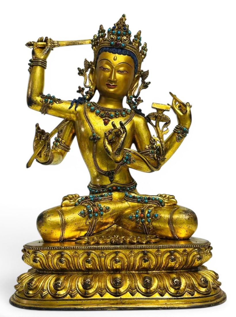 Himalayan Art, Tibet, 17th–18th Century, A Gilt Bronze Figure of Four-Armed Manjushri: Himalayan Art, Tibet, 17th–18th Century, A Gilt Bronze Figure of Four-Armed Manjushri, Height: 38 cm.