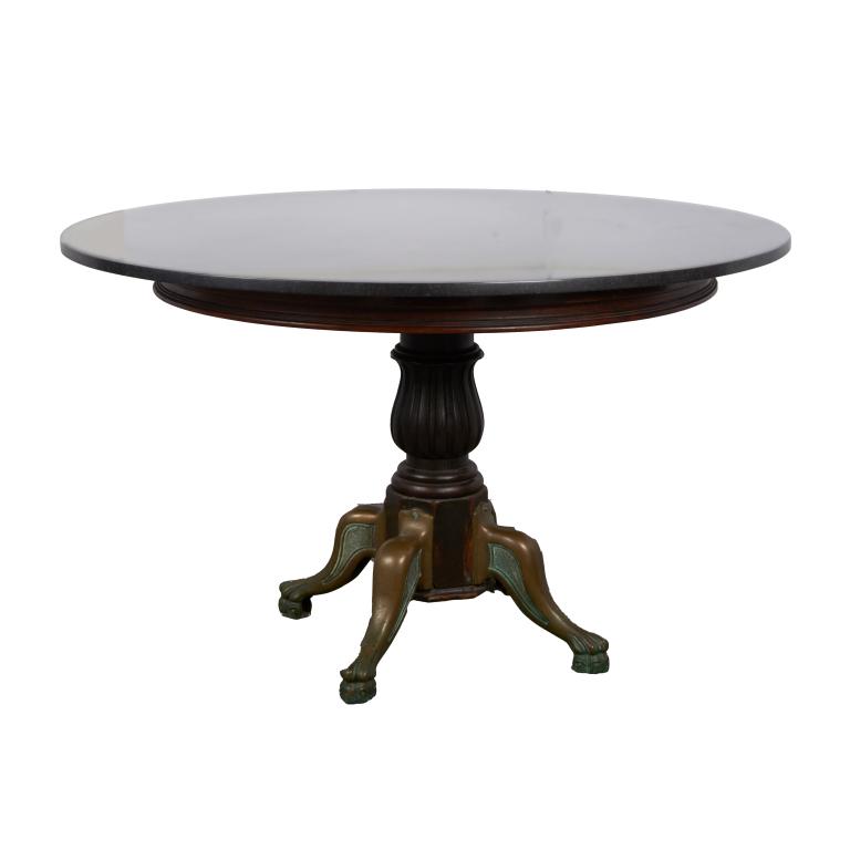 Late 19th century marble top dinning table: Late 19th century marble top dinning table on a raised on a single molded wood center support terminating on radiating cabriole brass legs Dimensions Approx. 32"h x 55" round Dimensions: Approx. 32"h