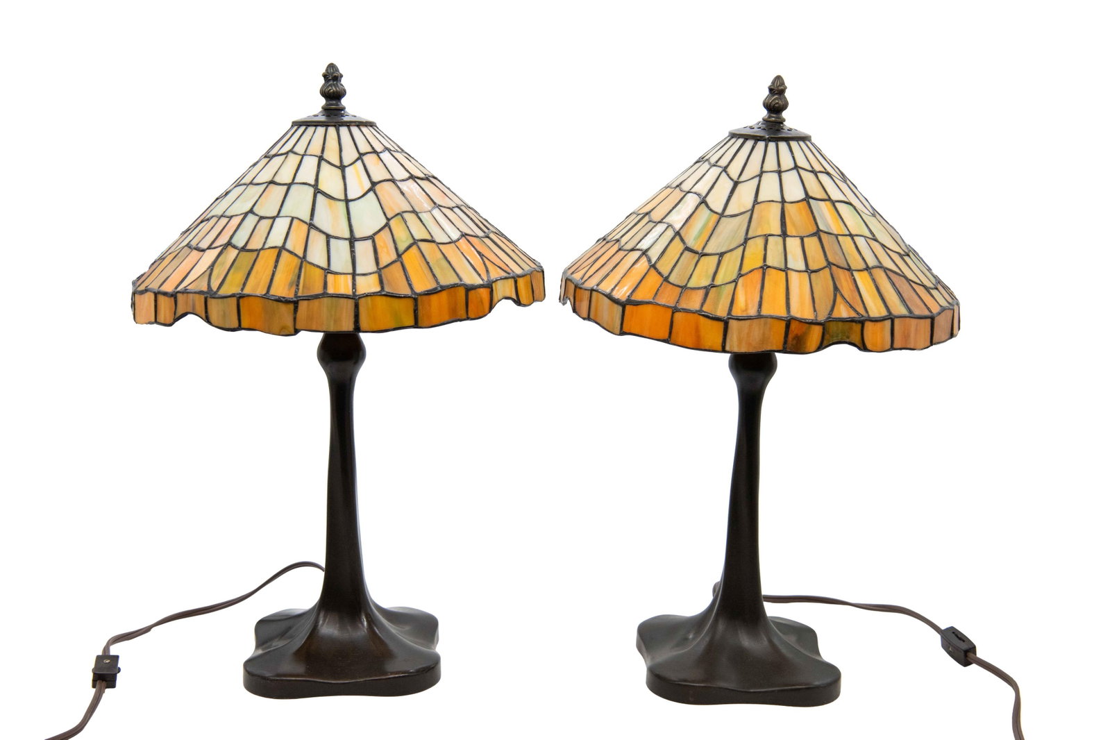 Pair of Amber Tone Slag Glass Arts & Crafts Lamps: Pair of Amber Tone Slag Glass Arts & Crafts Lamps Approximate size each: 19” H x 12” W x 12” D Both lamps tested and work. Lampshades have minor cracks in the glass. Any lamp wiring 