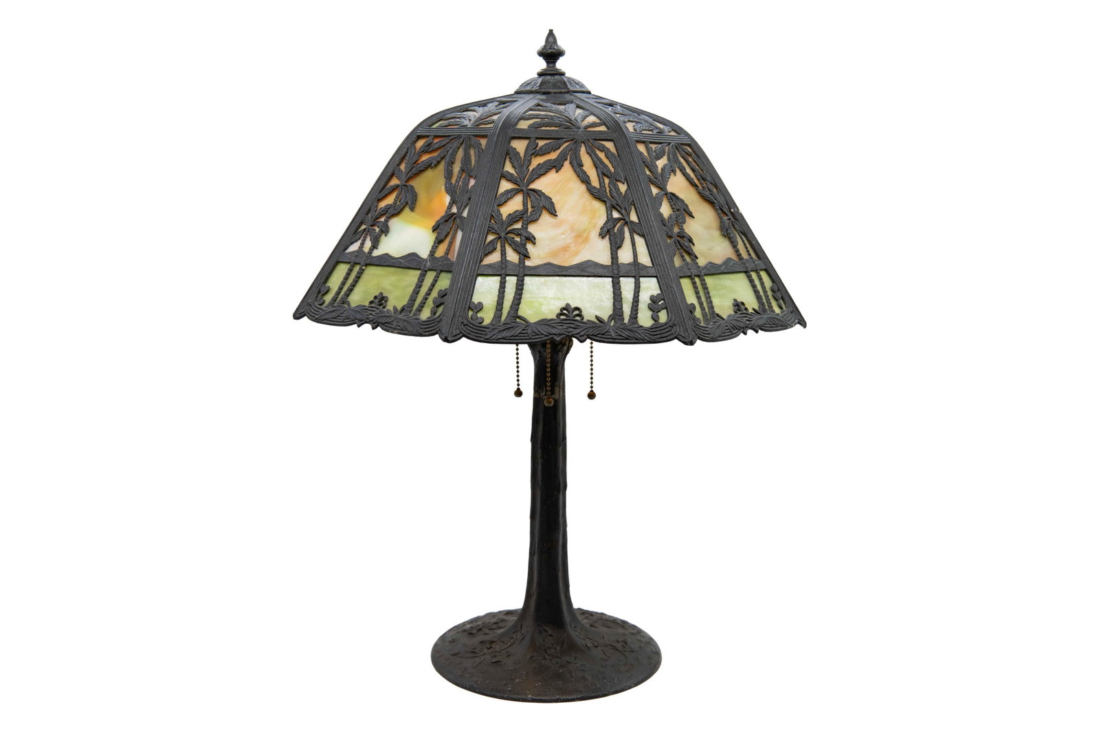 Antique Palm Tree Slag Glass Lamp: Antique Palm Tree Slag Glass Lamp Approximate size: 23” H x 17.25” W x 17.25” D Lamp tested and works. Any lamp wiring is offered strictly as found. No guarantee is made as to the co