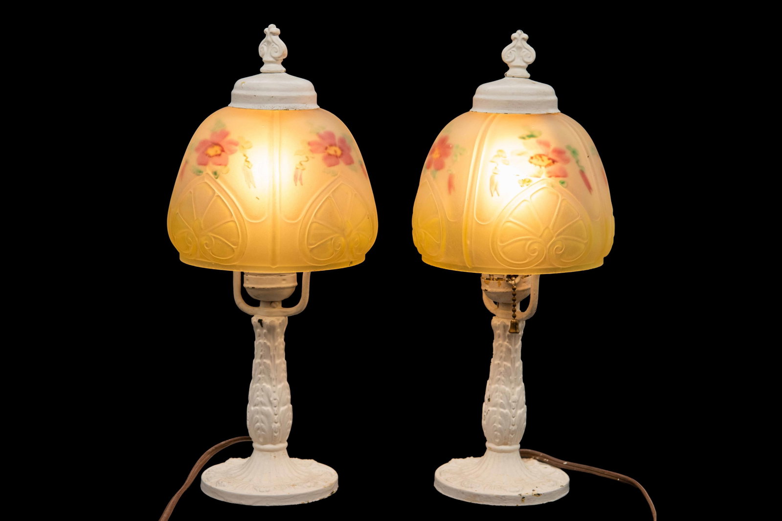 Pair of Metal Table Lamps with Frosted Hand Painted Glass Shades: Pair of Metal Table Lamps with Frosted Hand Painted Glass Shades Approximate size each: 13.25” H x 5.5” W x 5.5” D Both lamps tested and work. Any lamp wiring is offered strictly as 