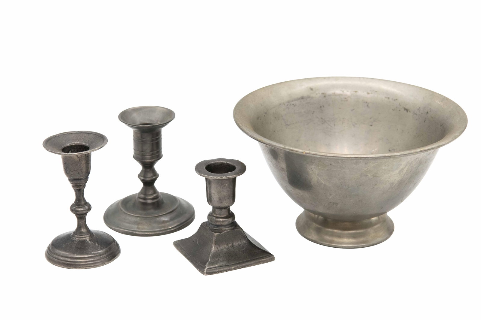 Set of 3 Pewter Candleholders and Decorative Bowl: Set of 3 Pewter Candleholders and Decorative Bowl Approximate size of largest candleholder: 3.5: H x 3" W x 3" D Approximate size of bowl: 4" H x 7.25" 7.25" D