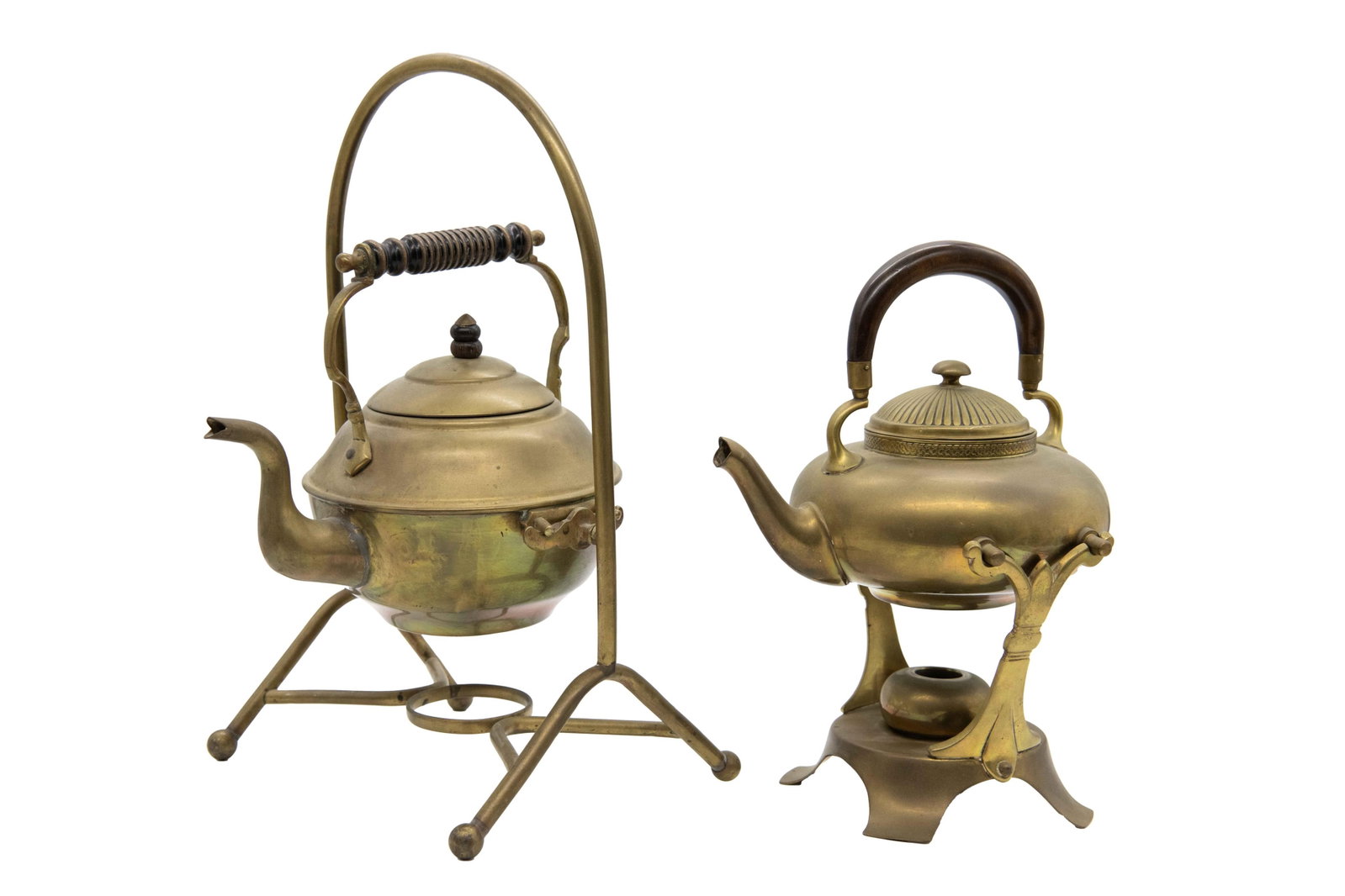 Two Antique Brass Tilting Spirit Kettles: Two Antique Brass Tilting Spirit Kettles One unmarked, one marked Gotham and Co. Approximate size of large kettle: 14.5” H x 8.5” W x 9” D Approximate size of small kettle: