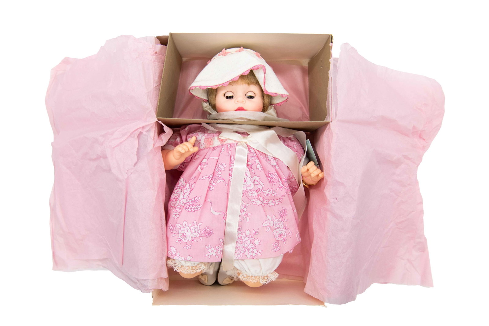 Madame Alexander ‘Pink Garden Pussycat’ 29280 Doll, 1998: Madame Alexander ‘Pink Garden Pussycat’ 29280 Doll, 1998 Box has minor tears, creases, foxing and dents commensurate with age. Approximate box size: 4.5” H x 9” W x 14” D
