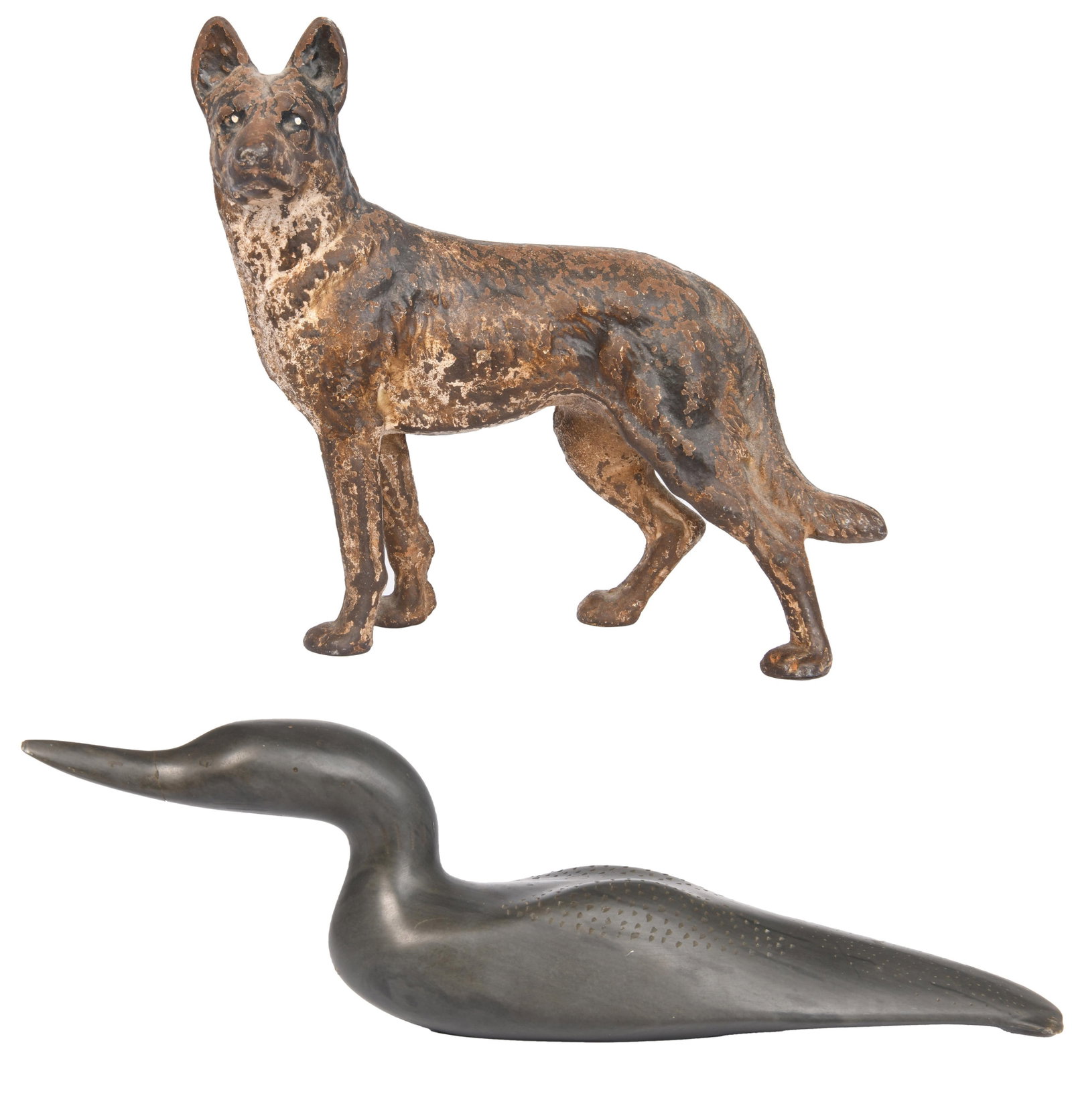 Group of 2: Cast Iron Dog & Stone Duck: Group of 2: Cast Iron Dog & Stone Duck Carved Stone Duck with Etched Wing Detail German Shepherd Dog Cast Iron Door Stop Approximate Size of Dog: 9” H x 9” W x 3.25” D Illegible sign