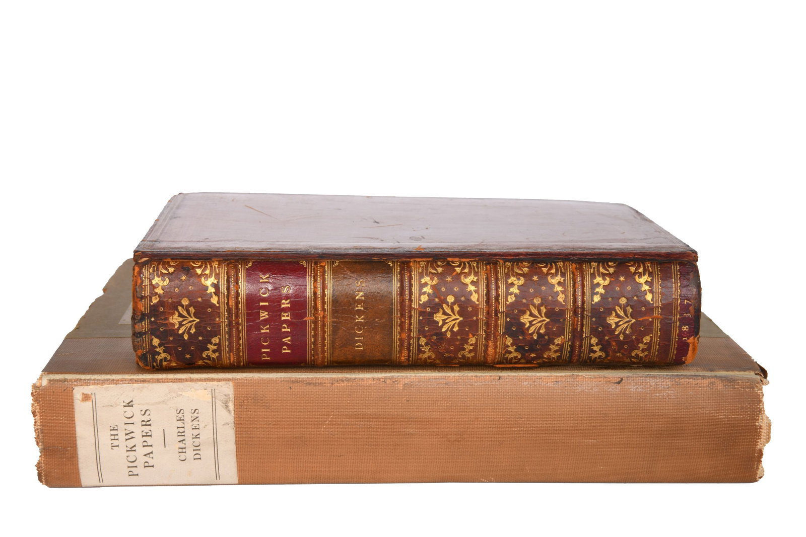 Group of 2 Charles Dickens Books: Group of 2 Charles Dickens Books 1. Pickwick Papers By Charles Dickens Published by London Chapman London, 1837 1st Edition Hard Cover Rebound Scratches on front and back cover Back cover completely u