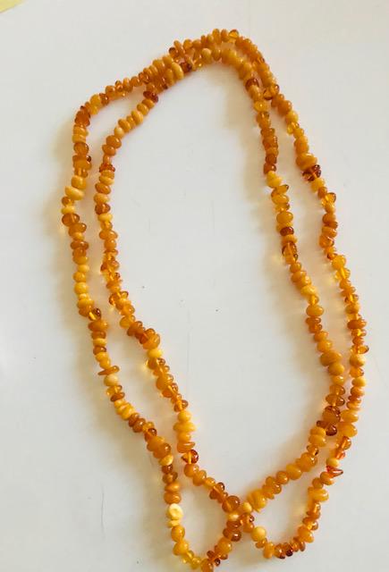 Butterscotch Amber Long Necklace: Polished butterscotch amber necklace