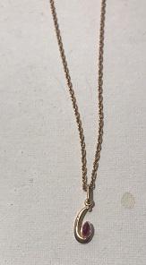 14 kt Rose Gold Chain Necklace with Pendant: 14vKt Rose Gold Chain Necklace with a tear drop pendant, synthetic ruby stone, 5.3 gr total weight.