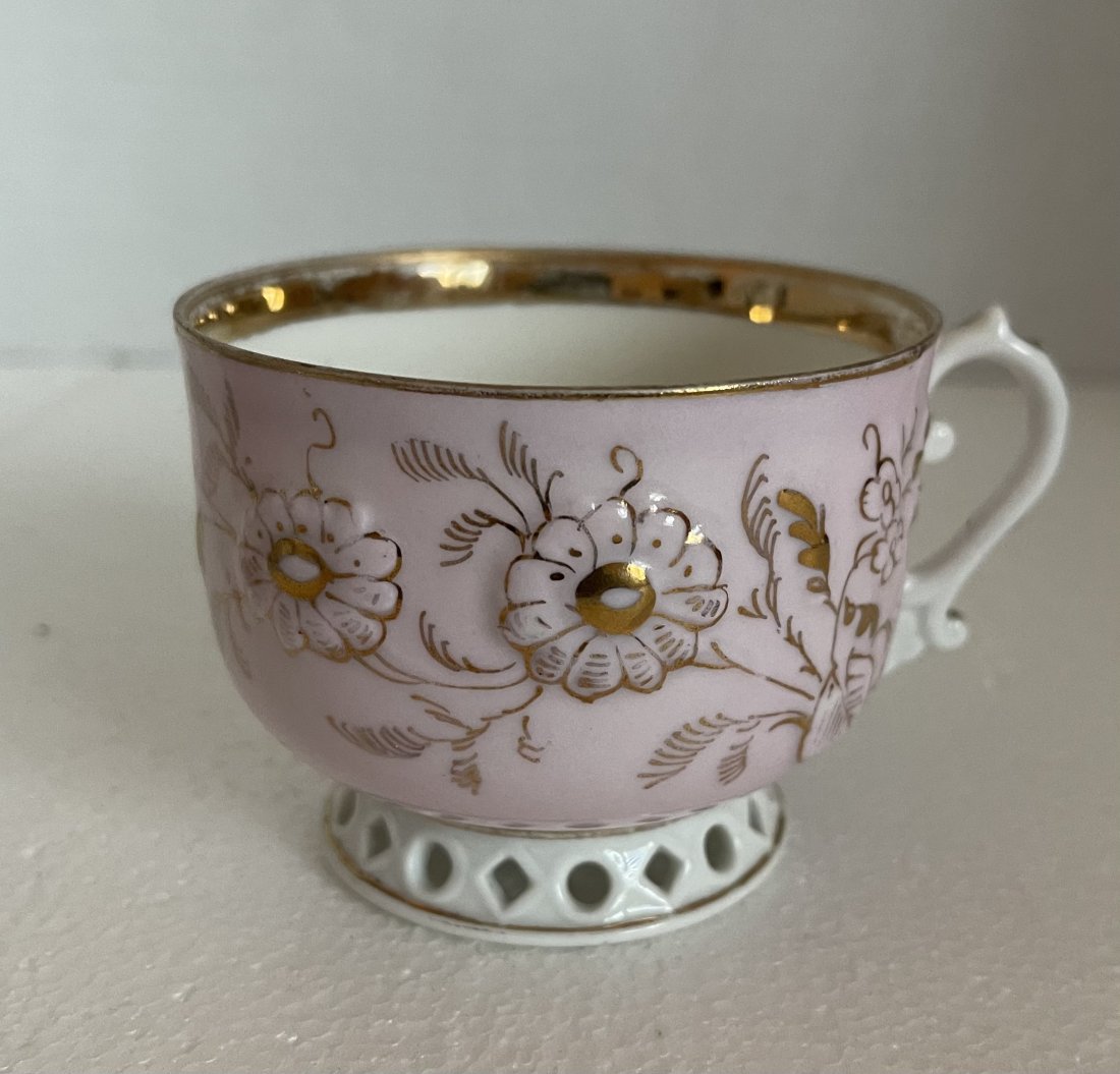 Antique Kuznetsov Porcelain Tea Cup: Antique Russian Porcelain Kuznetsov factory tea cup,with gold and reticulated base.