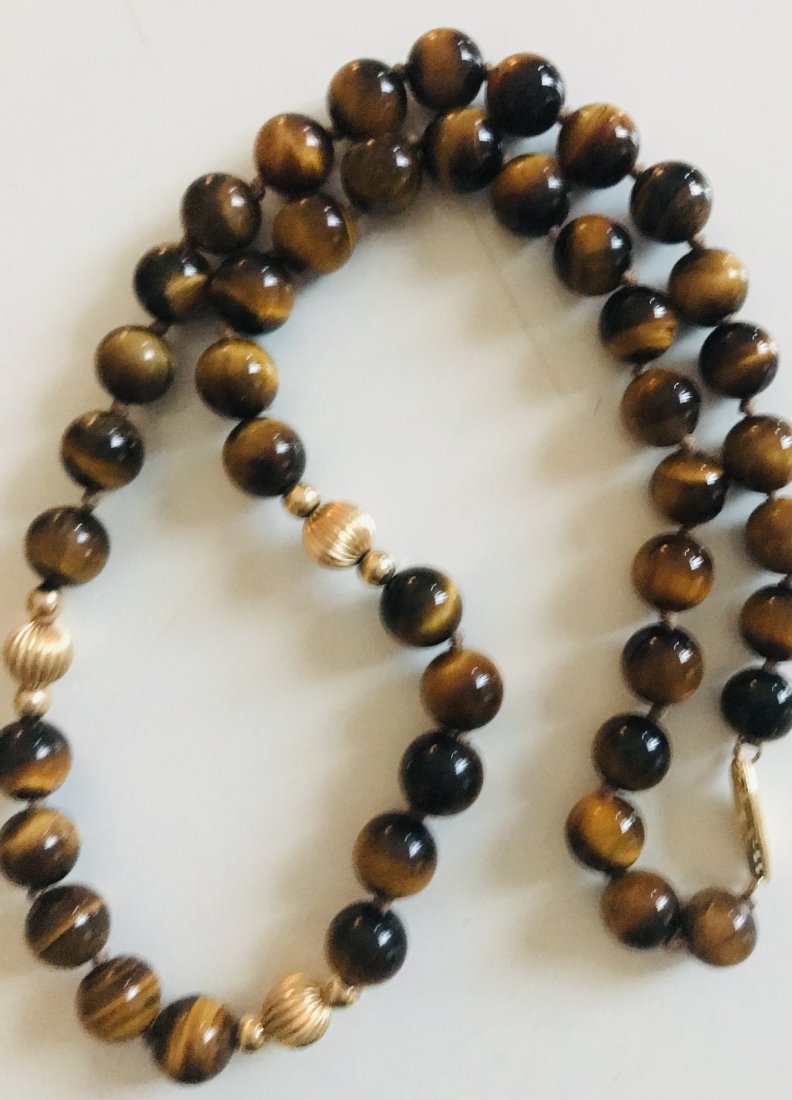 14k gold Tiger Eye Necklace Jewelry: 14k gold tiger eye polished beads necklace.