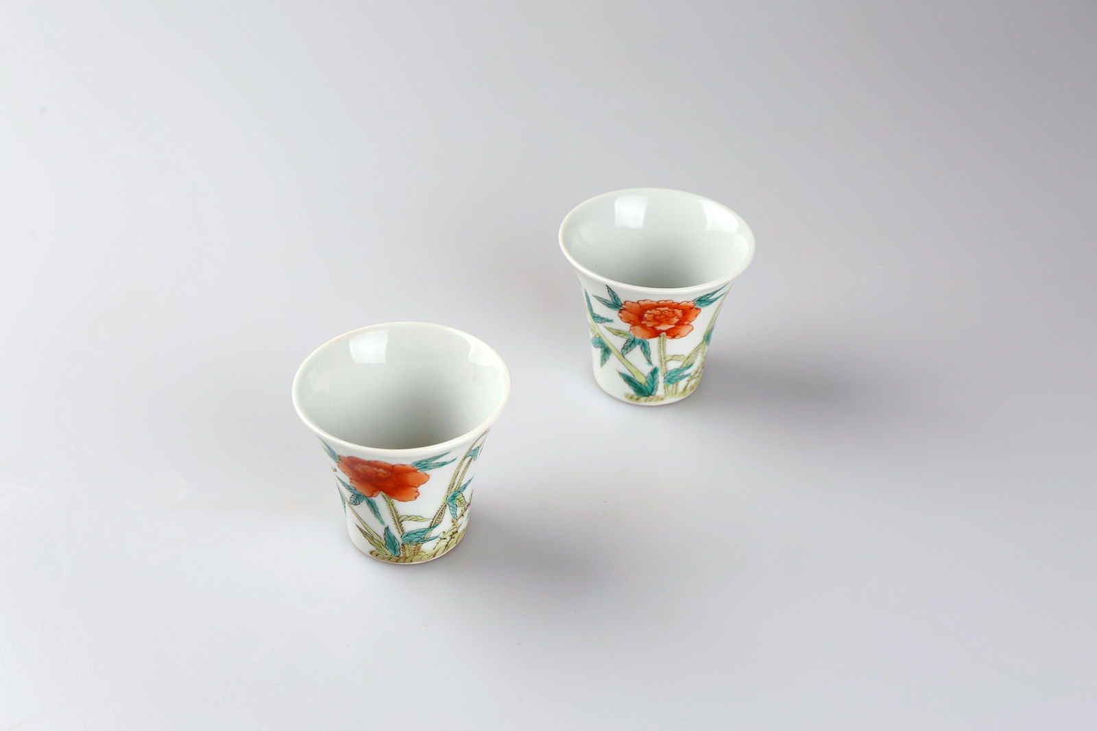 A pair of Qing Dynasty pastel floral tea cups (1 of 3)