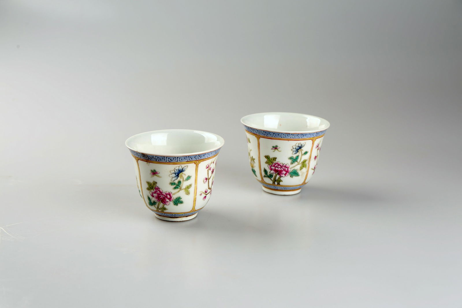 A pair of Qing Dynasty famille-rose tea cups (1 of 5)