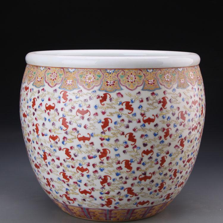 A large jar with a bat and cloud motif in famille-rose: Height 33cm Diameter 35cm