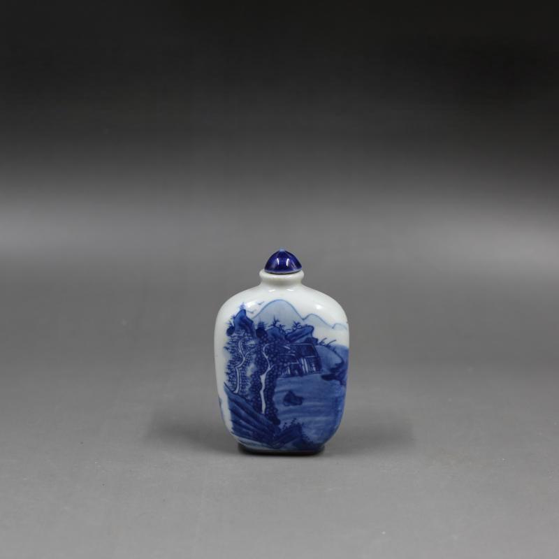 A blue and white porcelain landscape snuff bottle (1 of 6)