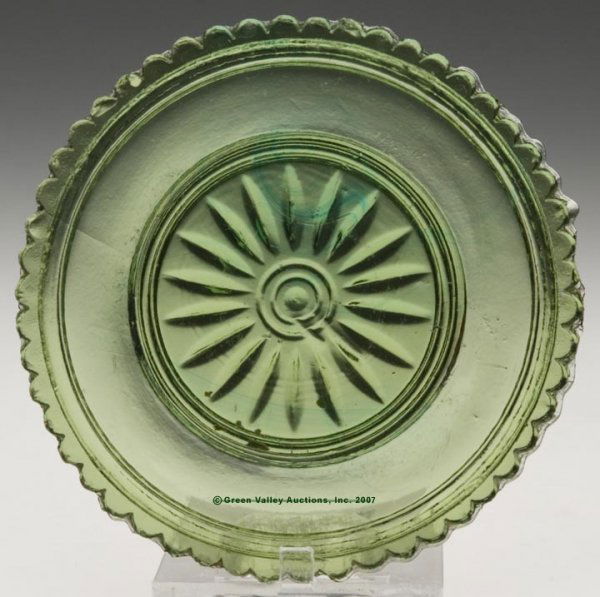LEE/ROSE NO. 501 CUP PLATE, olive green, 51 even: LEE/ROSE NO. 501 CUP PLATE, olive green, 51 even scallops. Scarce. Uncertain origin. 2 15/16" d. Provenance: Collection of Anne and the late Leon Powell. Abraham & May, 3/69, $45.