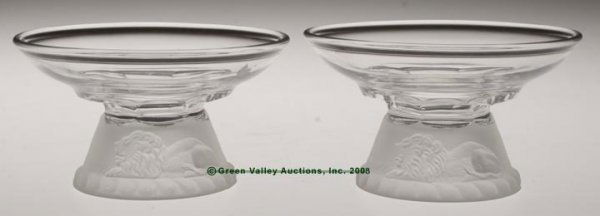 FROSTED LION UNLISTED SHERBETS, LOT OF TWO, colorl: FROSTED LION UNLISTED SHERBETS, LOT OF TWO, colorless, factory manipulated from egg cups. Fourth quarter 19th century. 2 1/2" h, 4 1/4" dia rim, and 2 3/8" h, 4 3/8" dia rim, both with 2 5/8" dia foot