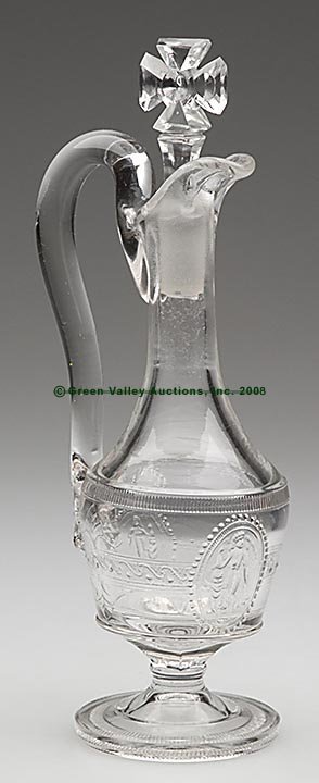 CUPID AND VENUS FOOTED CRUET, colorless, applied 