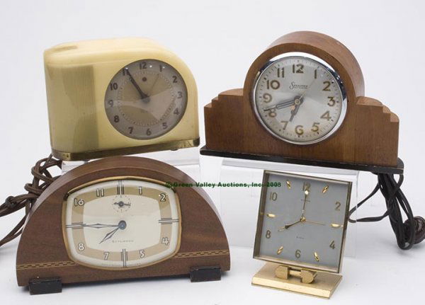 ART DECO CLOCKS, LOT OF FOUR, consisting of a "Sty: ART DECO CLOCKS, LOT OF FOUR, consisting of a "Stylwood" alarm clock, a "Sessions Self Starting Model W" electric clock, a desk top "Guardier 8 Days", stamped on base "Swiss Made" and on mechanism cov