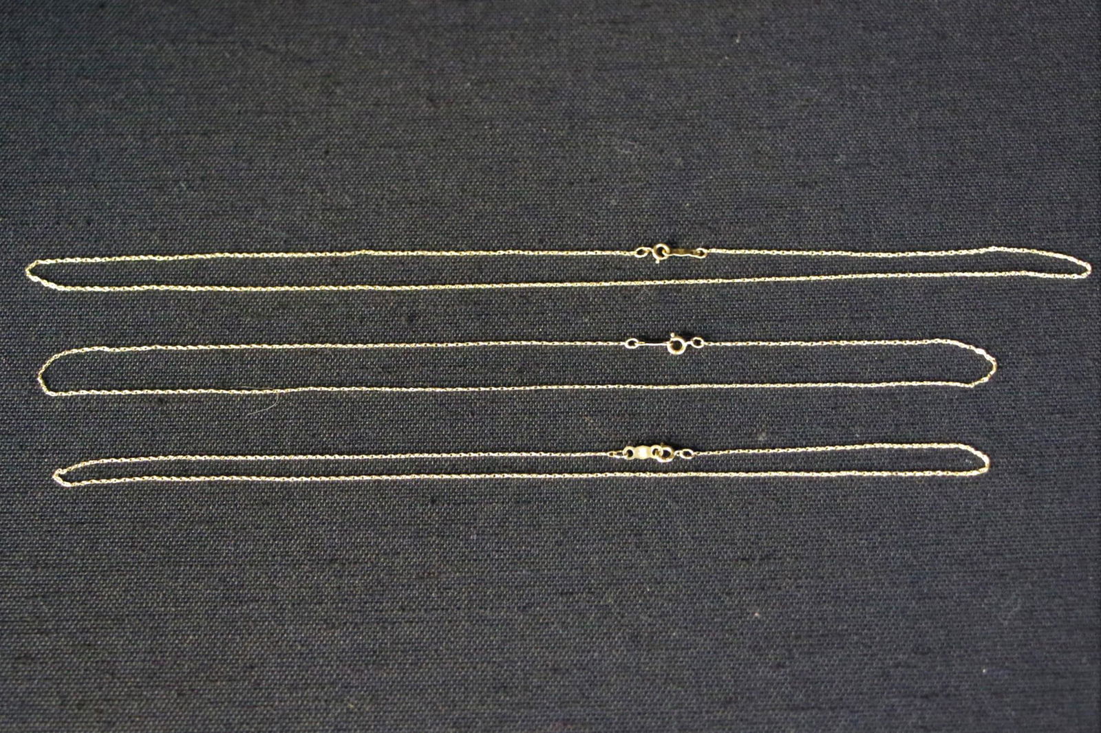 Collection of Three Gold Necklaces (1 of 2)