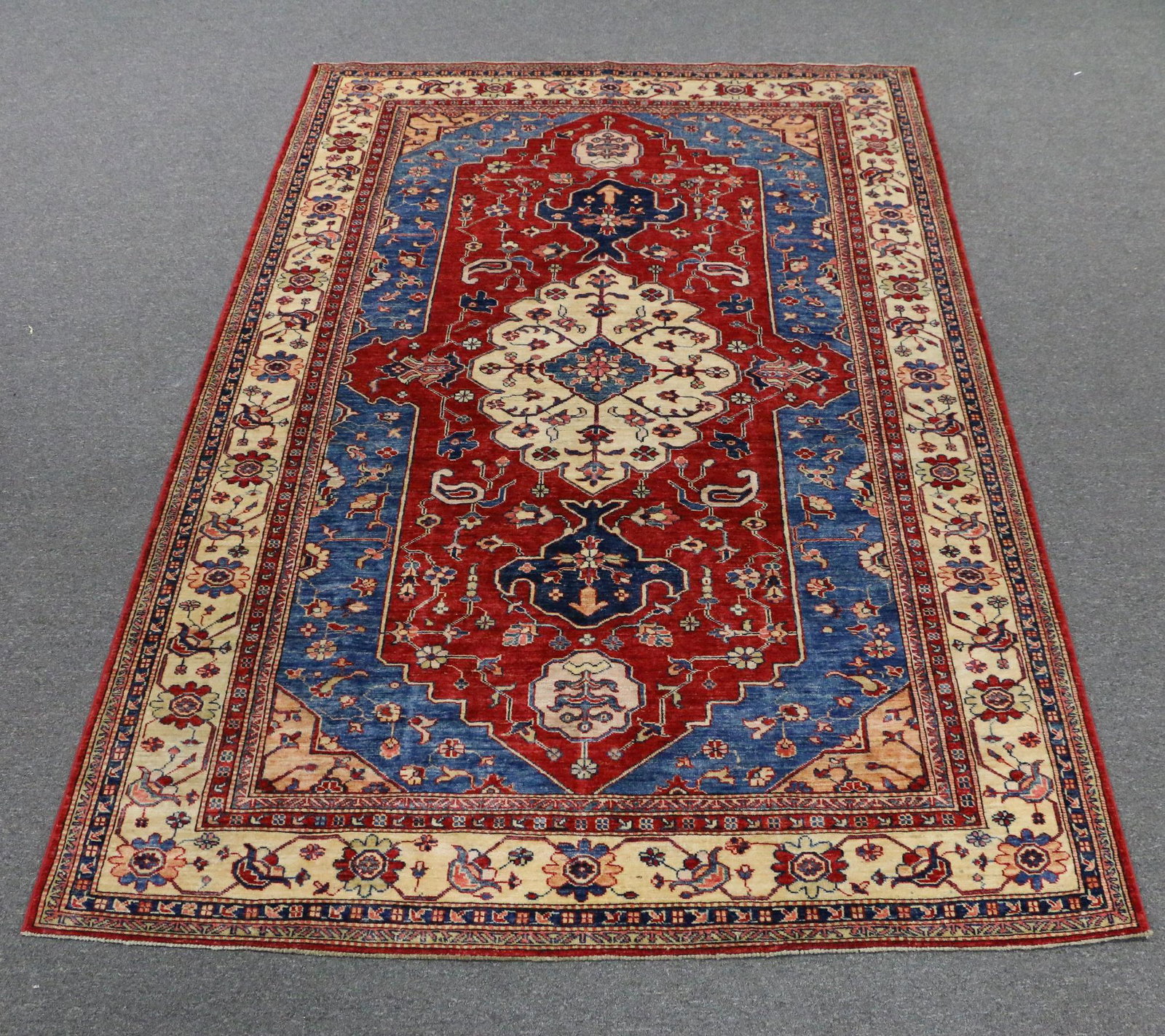 Wool Area Rug: Wool area rug; Measures approximately H 105 x W 71 inches; Minor stains; See photos.