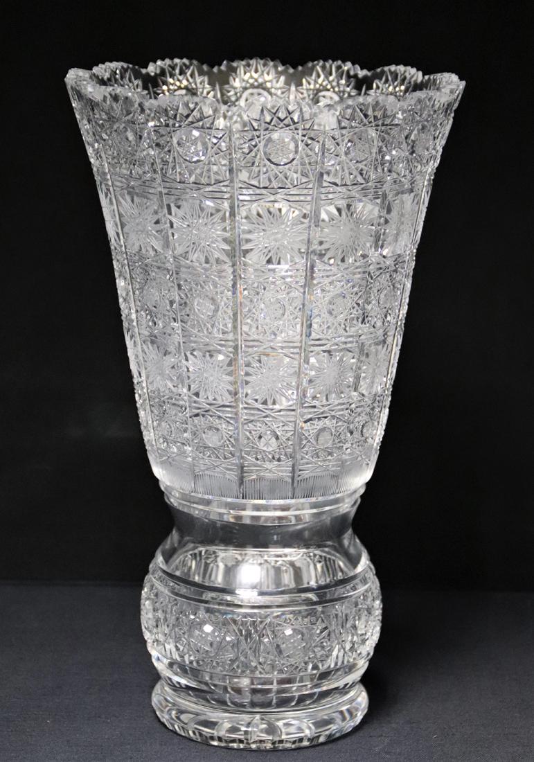 Eastern European Brilliant Cut Glass Vase: Large brilliant cut glass vase with saw tooth top; No visible makers mark; Measures approximately H 12 x 7 inches diameter; No visible damage. See photos