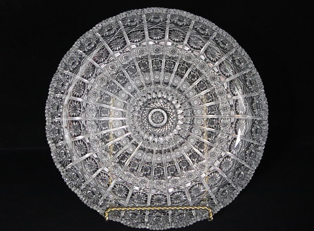 Eastern European Brilliant Glass Cut Platter: Saw tooth scalloped edge serving plate; Measures approximately H 1 1/2 x 11 1/4 inches diameter; No visible makers mark: No damage observed. See photos