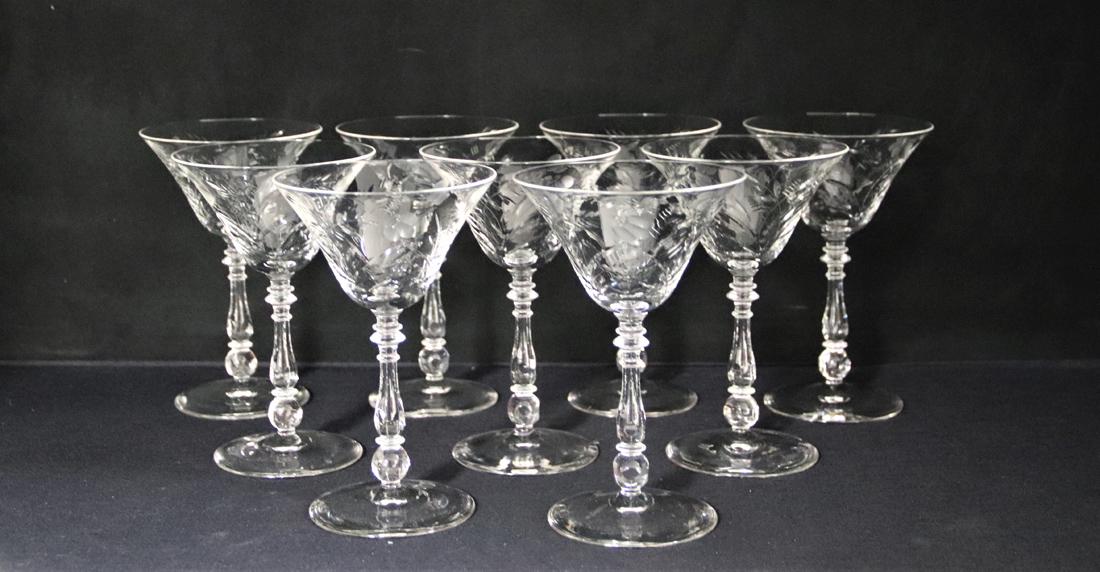 Collection of Wine Glasses: Nine decorative etched cocktail stemware; Measures approximately H 6 1/4 x 4 diameter inches across the top; No makers mark; No obvious damage. See photos.