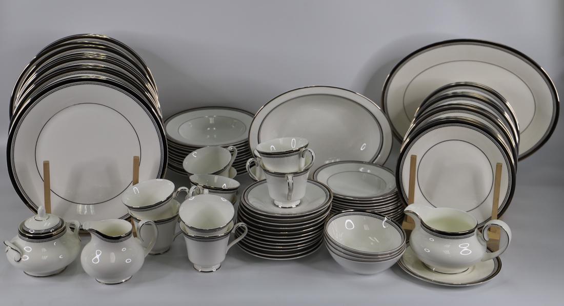 Royal Doulton, Sarabande Dishes: Large collection of English fine bone china in the Sarabande pattern; Pieces include twelve dinner plates, thirteen salad plates, twelve bread and butter plates, twelve teacups and saucers, twelve sou