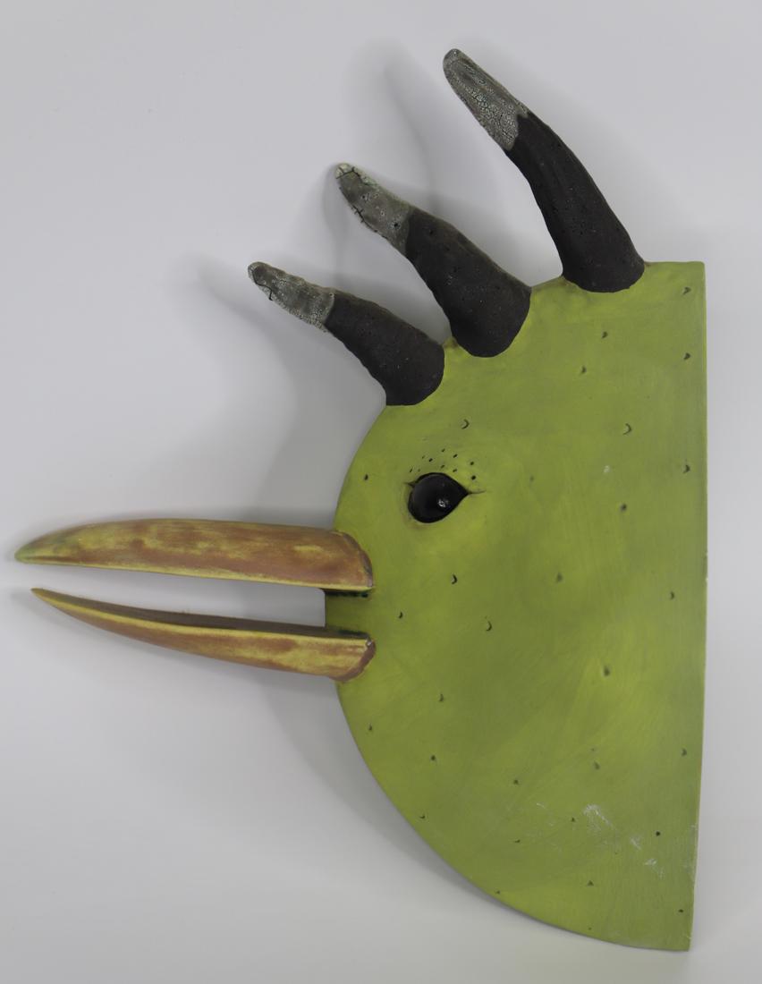 M. Hall, Pottery Sculpture: Painted clay sculpture of a bird head; Signed "M. Hall" on back; Designed to be hung on a wall; Measures approximately H 9 x 6 1/4 x D 9 1/2 inches; No damage observed. See photos