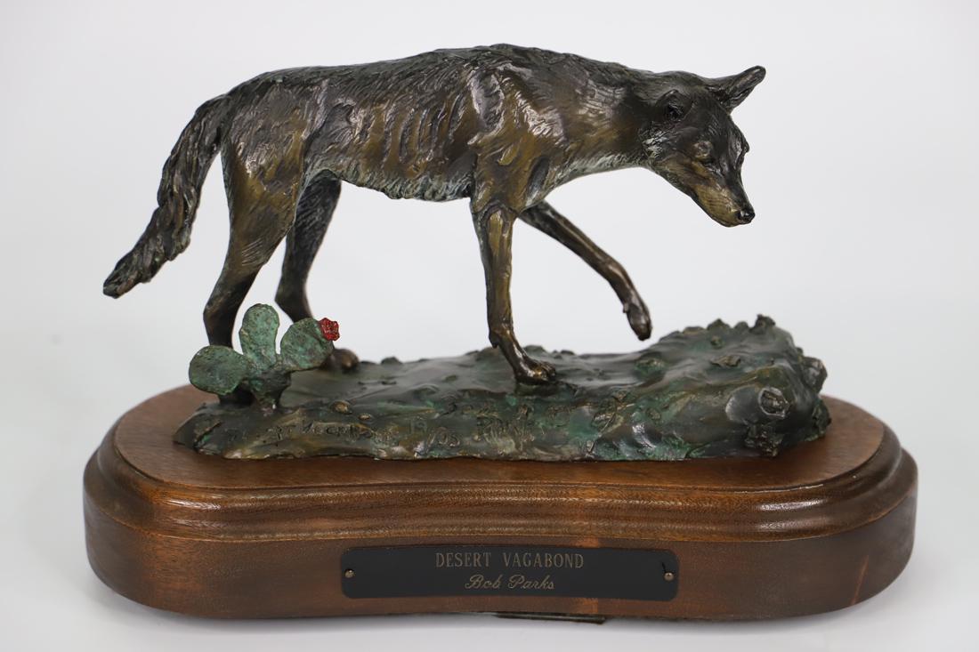Bob Parks, Bronze Sculpture: Bronze sculpture titled "Desert Vagabond"; Artist signature and number 19/35 on base; Sculpture is mounted on a wooden swivel stand that has a plaque with sculpture title and artist name; Measures app
