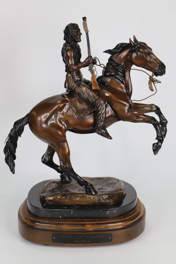 Bob Parks, Bronze Sculpture: Bronze sculpture titled "Warning from the Distance"; Artist signature and number 17/30 on base; Sculpture is mounted on a marble and wood swivel stand that has a plaque with sculpture title and artist