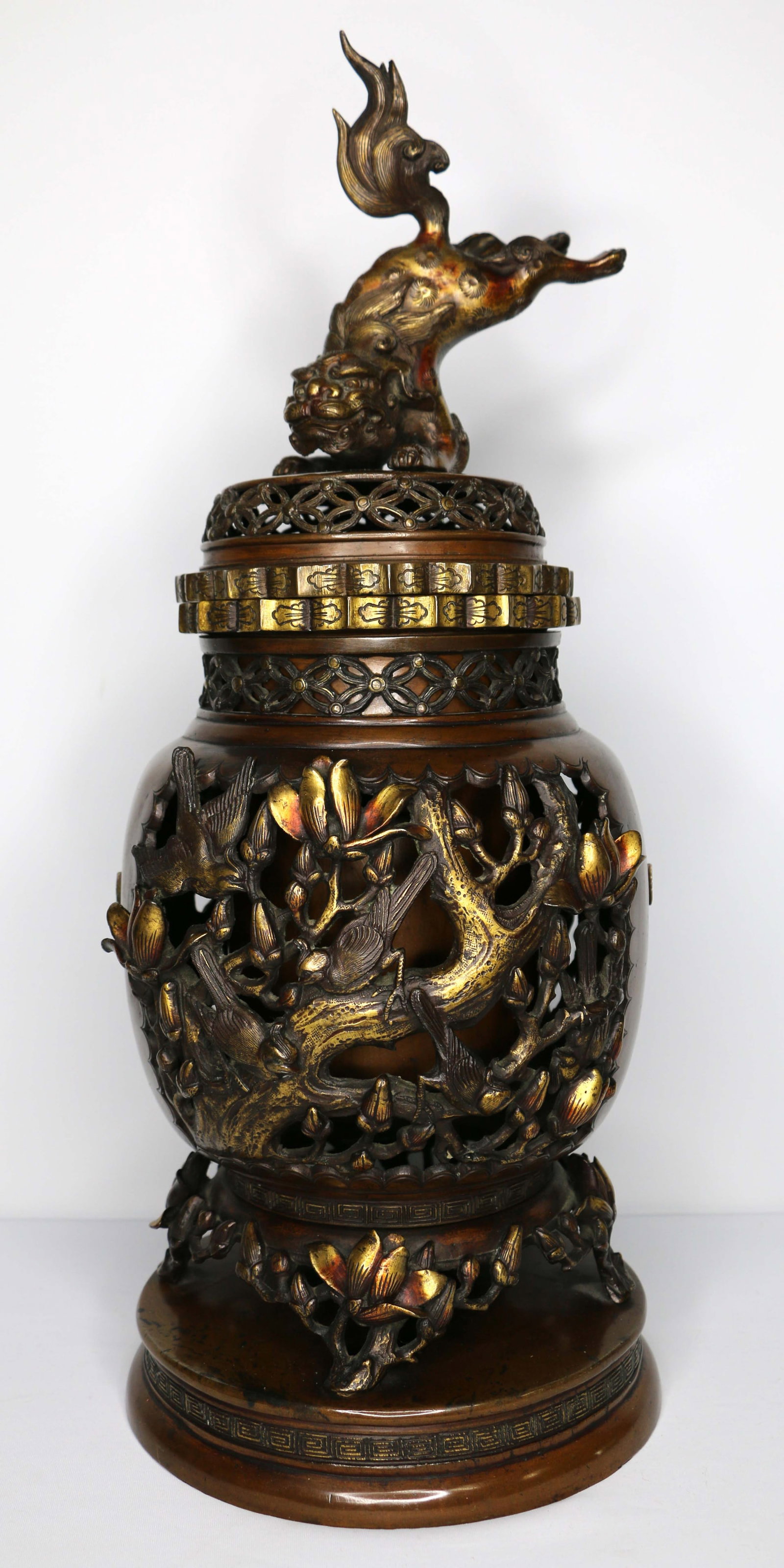 Chinese Censer: Bronze incense burner with lid; Foo dog on the lid; No maker marks observed; Possibly late 20th century; Measures approximately H 21 x Diameter 8 1/2 inches; Wear commensurate with age; See photos. Pi