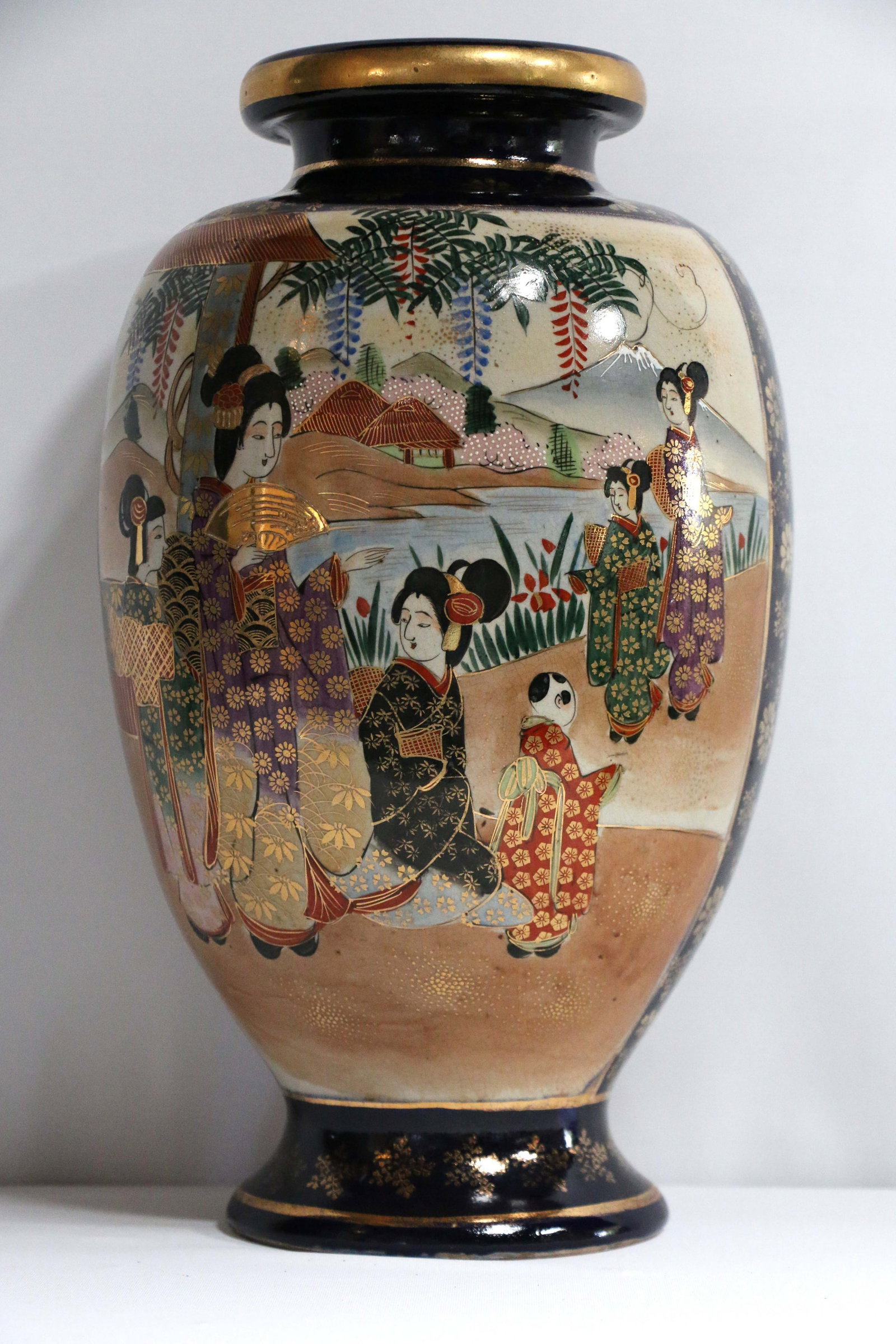 Japanese Vase: Vintage vase in a Satsuma style; Marked on bottom; Measures approximately H 15 x Diameter 9 inches; No damage observed; See photos. Pick up in Denver